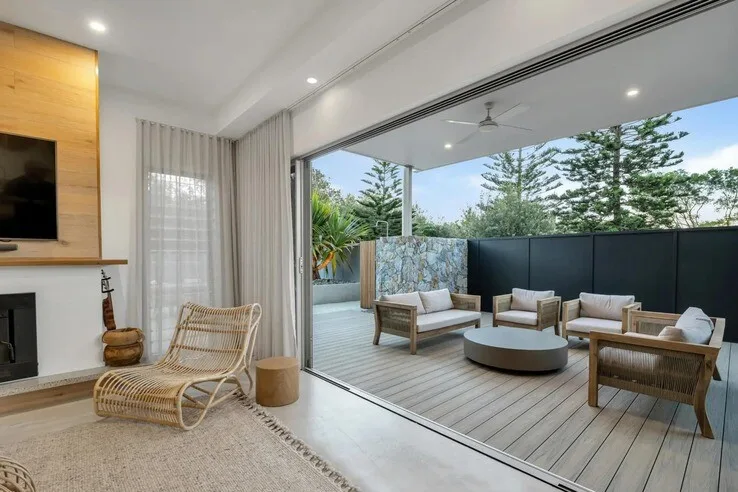 open plan house with exterior veranda featuring composite decking | Featured image of the Composite Deck Maintenance Tips blog page